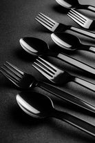 Black plastic cutlery by Studio OMG on GIANT ART - black photo illustration