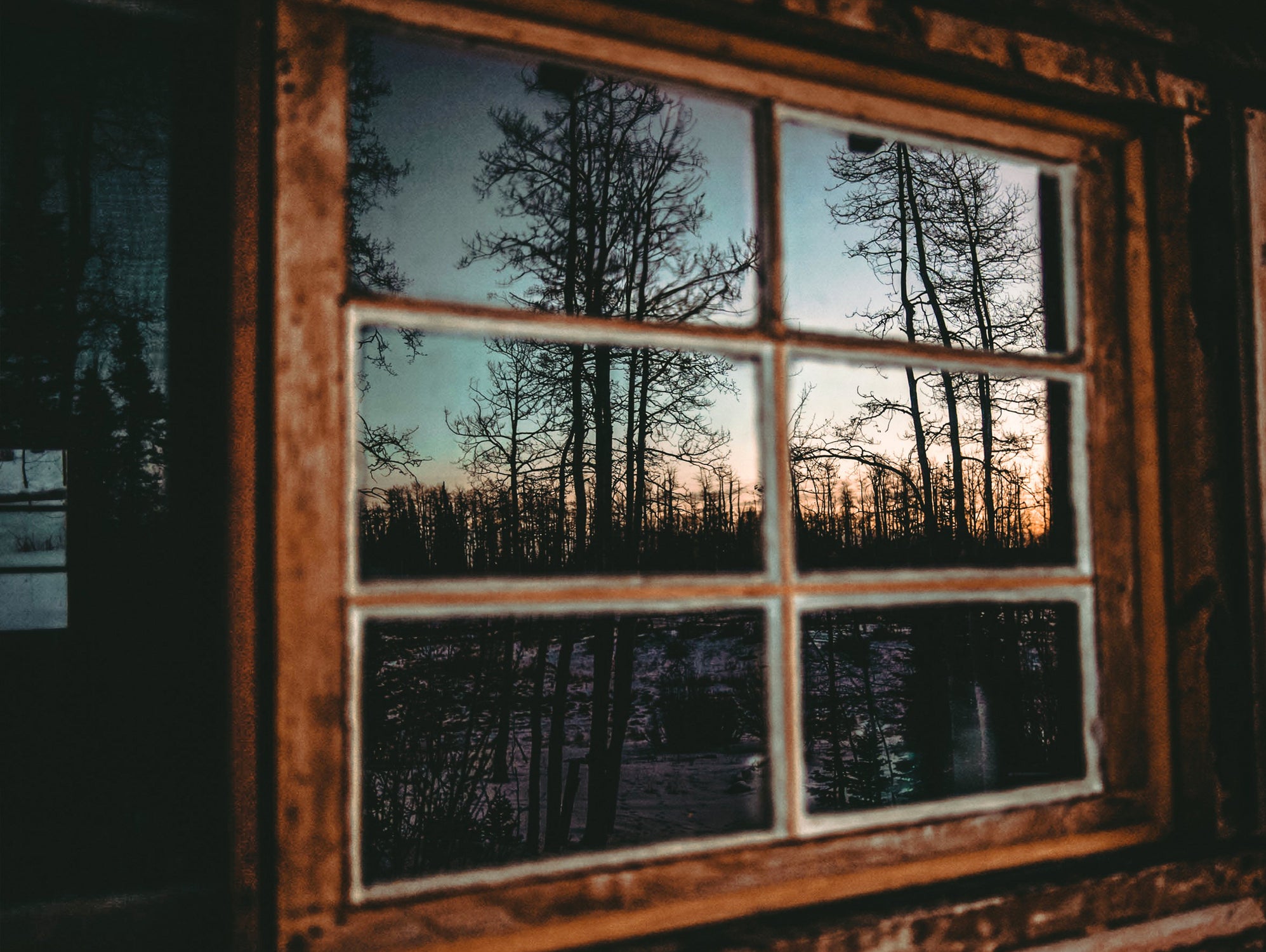 Grainy Sunset Reflection on Log Cabin Window by RJ Byrd on GIANT ART - blue photo illustration